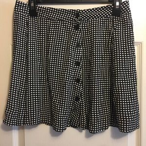 Black and white button up checkered skirt.